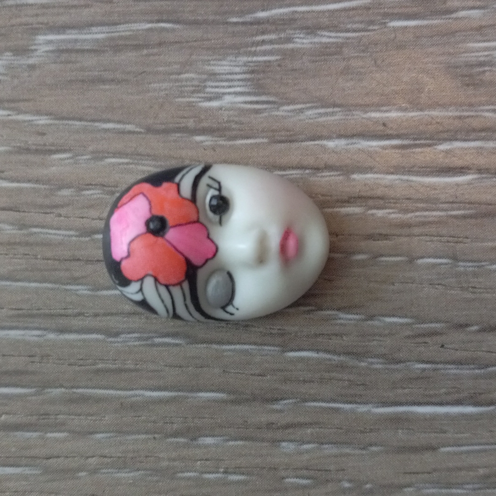 Porcelain face brooche